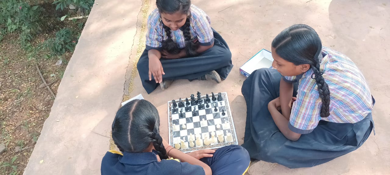 Students playing chess